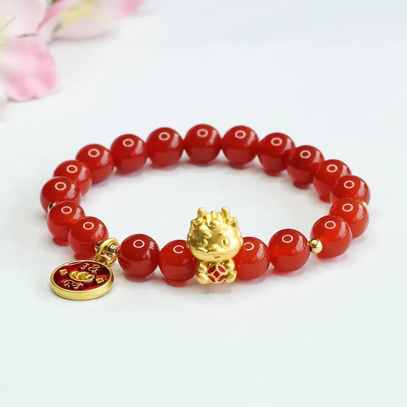 Close-up of a red agate bead dragon zodiac bracelet with 8mm beads in a Chinese style.
