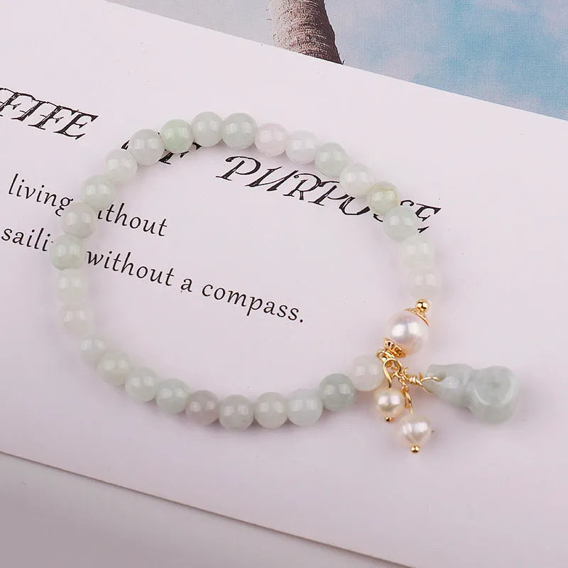 Handmade Chinese style jade bracelet with emerald colour, gourd design and pearl accents