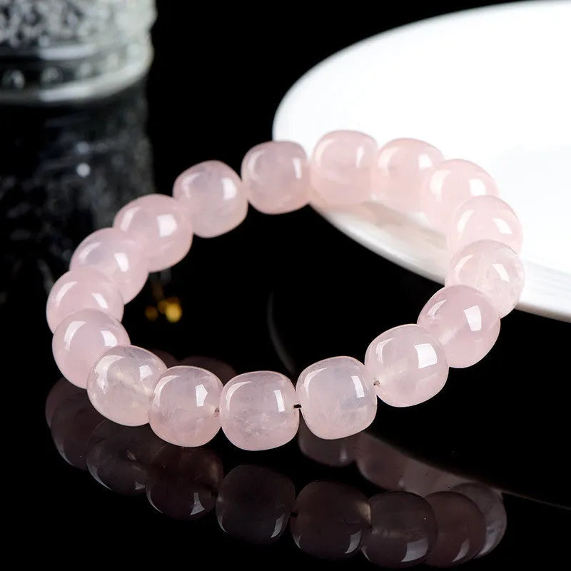 Pink crystal and bamboo bracelet with 11-12mm barrel beads and geometric design