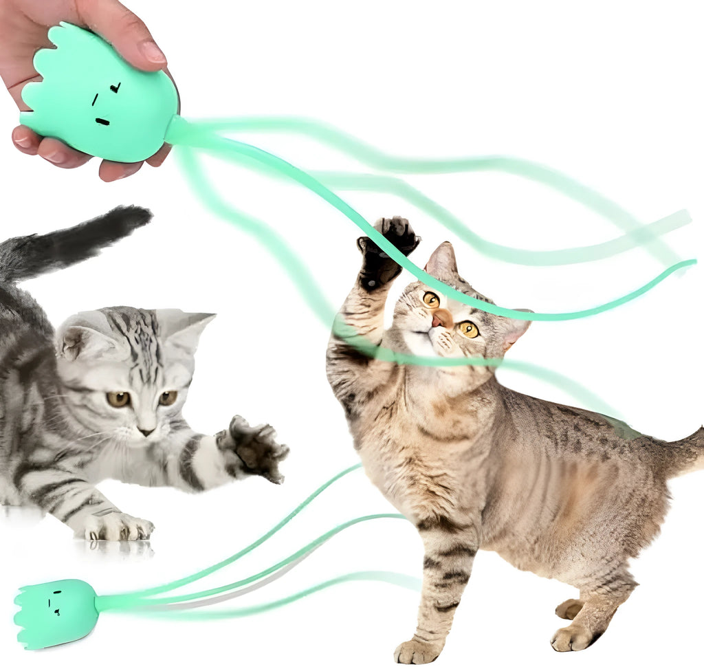 Rechargeable automatic cat toy with motorised swinging silicone tail on green background