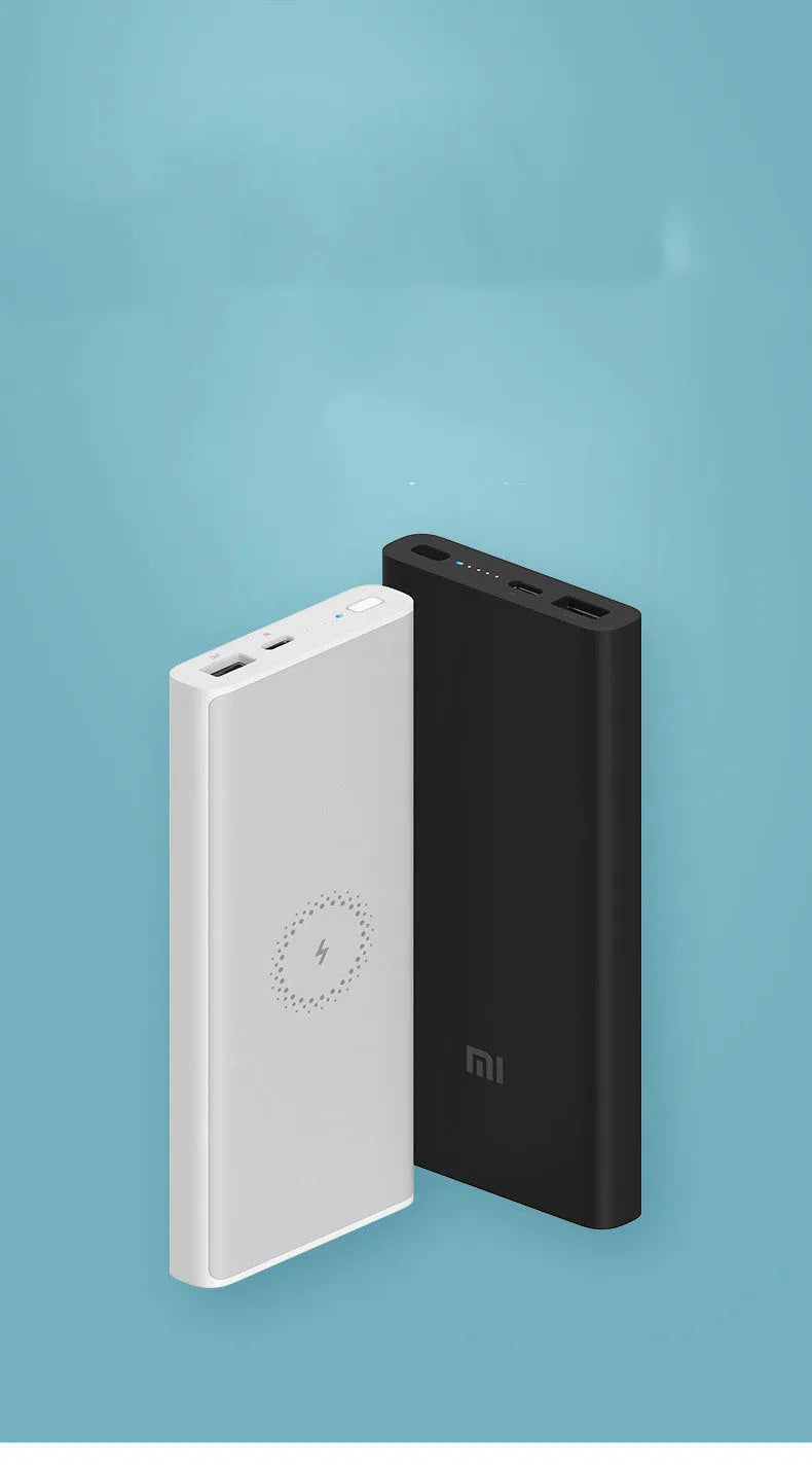 White and black large capacity 10000mAh power bank with USB Type-C port and wireless charging pad.