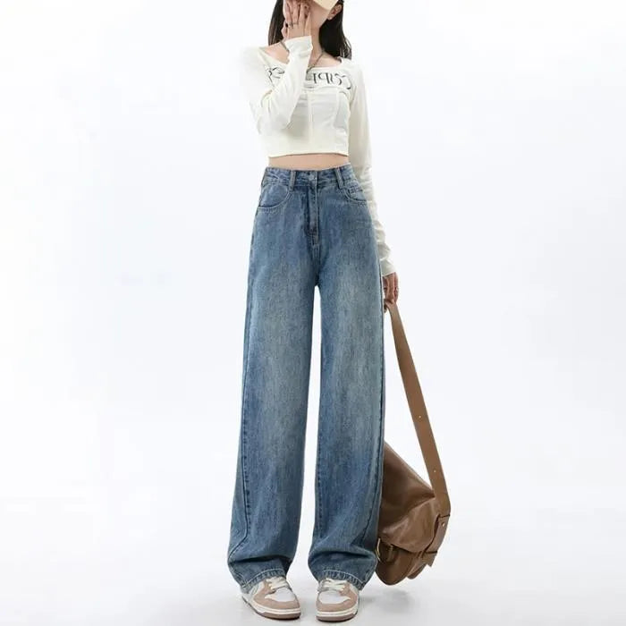 Women's retro blue wide leg jeans with high waist and straight leg silhouette on hanger