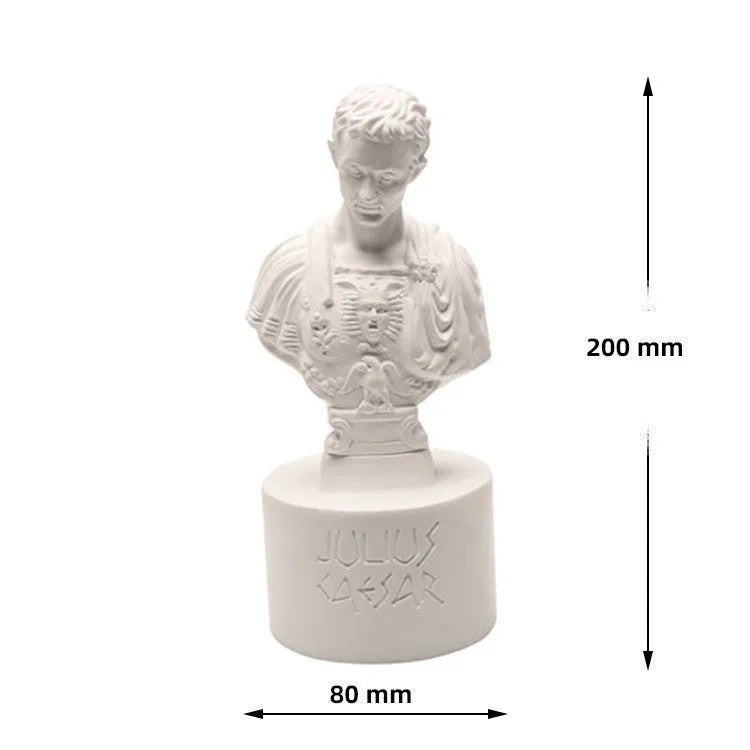 White synthetic resin character model pen holder on a desk.
