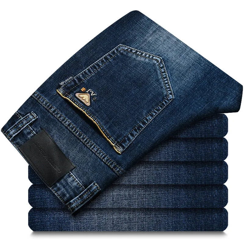 Men's elastic business straight jeans in 8151 blue wash with worn white finish, zipper fly, and pocket details