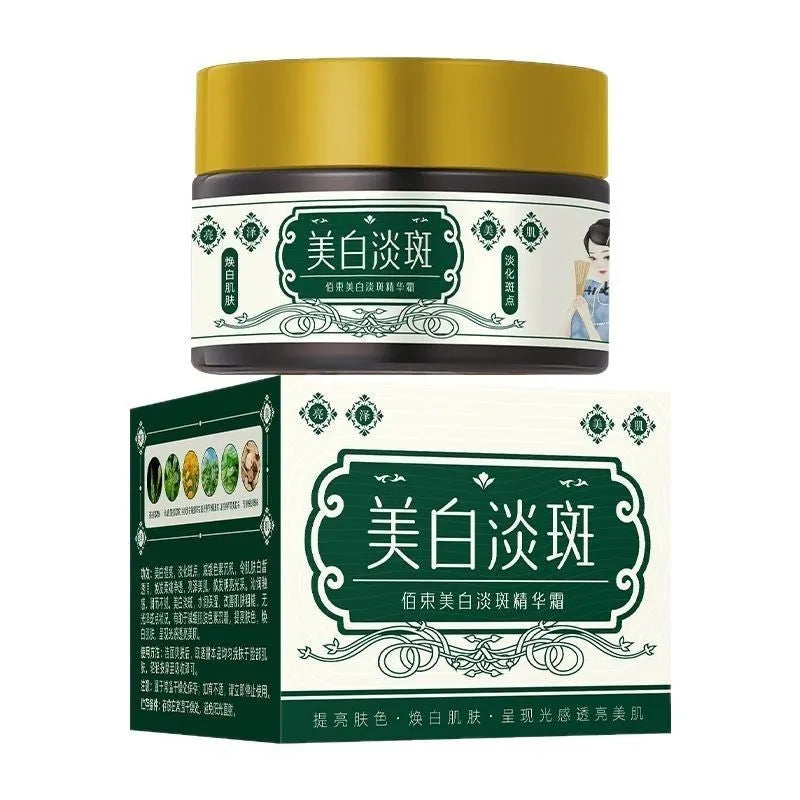 Baishu skin whitening and spots lightening essence cream in a 30g bottle with white and gold label