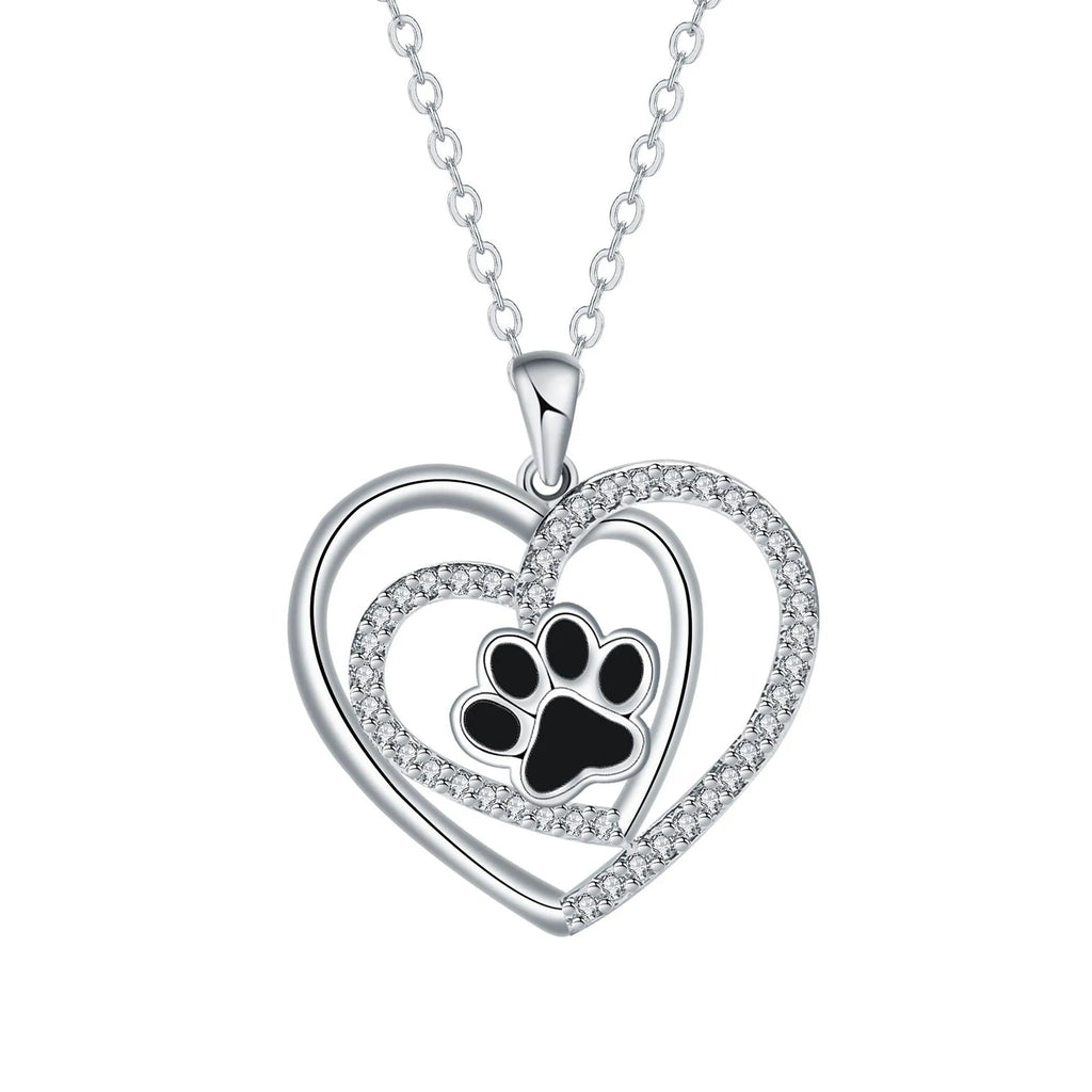 Women's dog paw print heart necklace on a cross chain, copper electroplated.