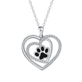 Women's dog paw print heart necklace on a cross chain, copper electroplated.