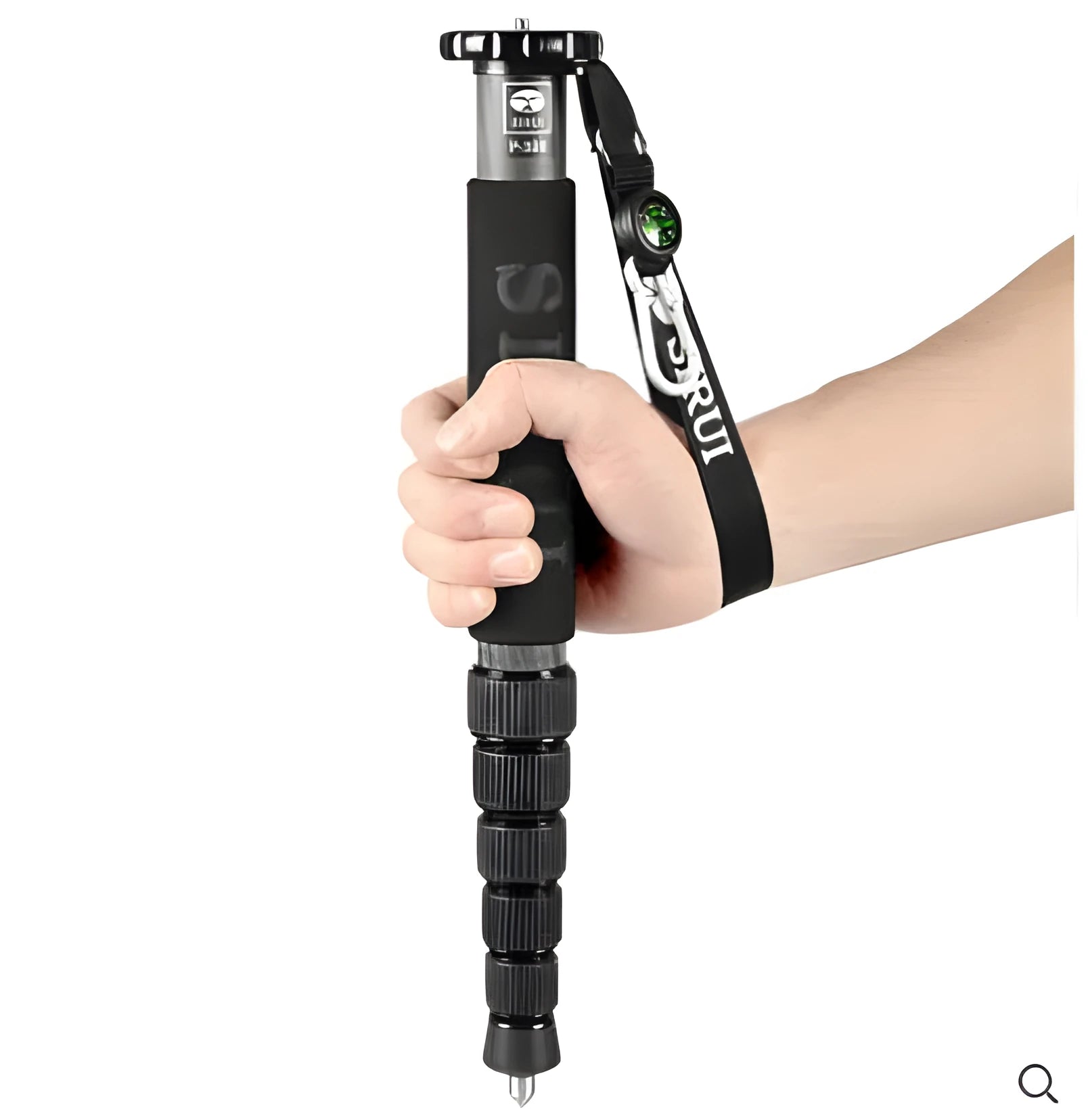 Black carbon fibre camera monopod extended to show six telescoping sections