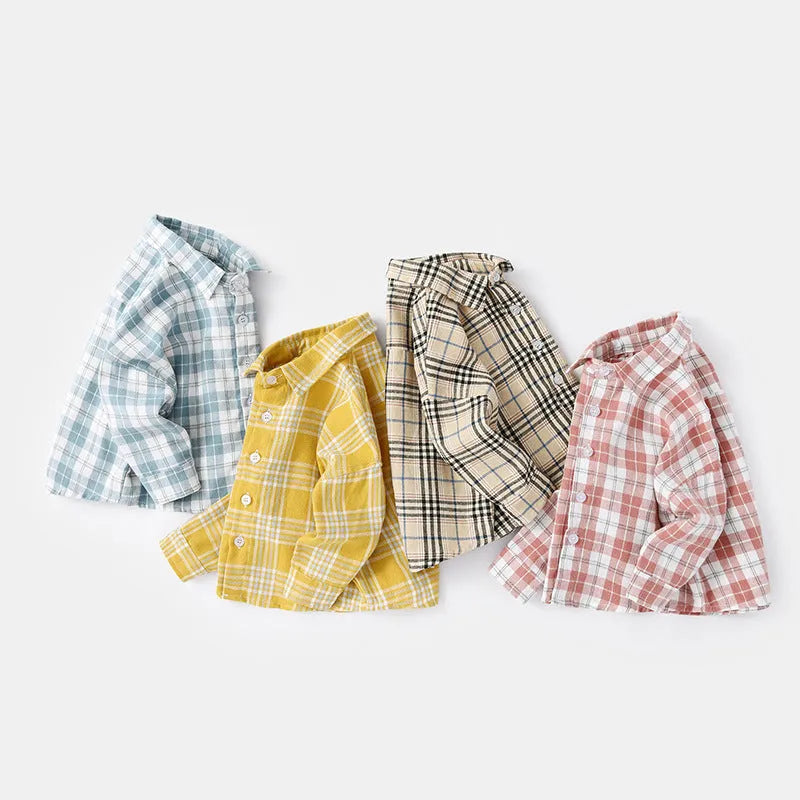 A boys' casual cotton lattice shirt with long sleeves, shown in one of four colours: khaki, light blue, pink, or yellow, featuring an animal or cartoon pattern.
