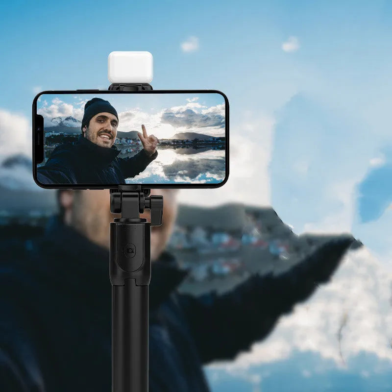 Aluminium alloy Bluetooth selfie stick and tripod with phone holder, shown in black colour.