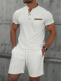 Men's waffle texture zipper polo collar short sleeve suit with matching solid colour shorts