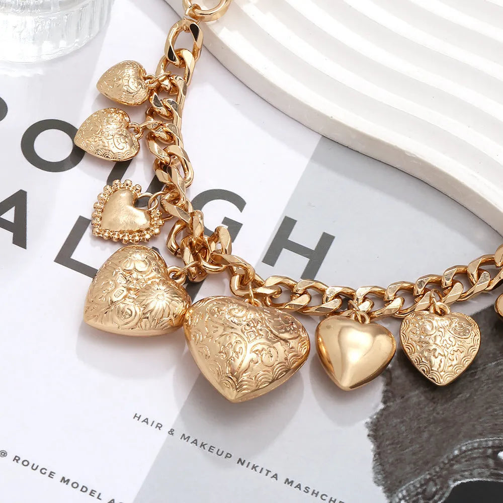 Exaggerated heart pendant necklace with adjustable chain in gold or white K finish