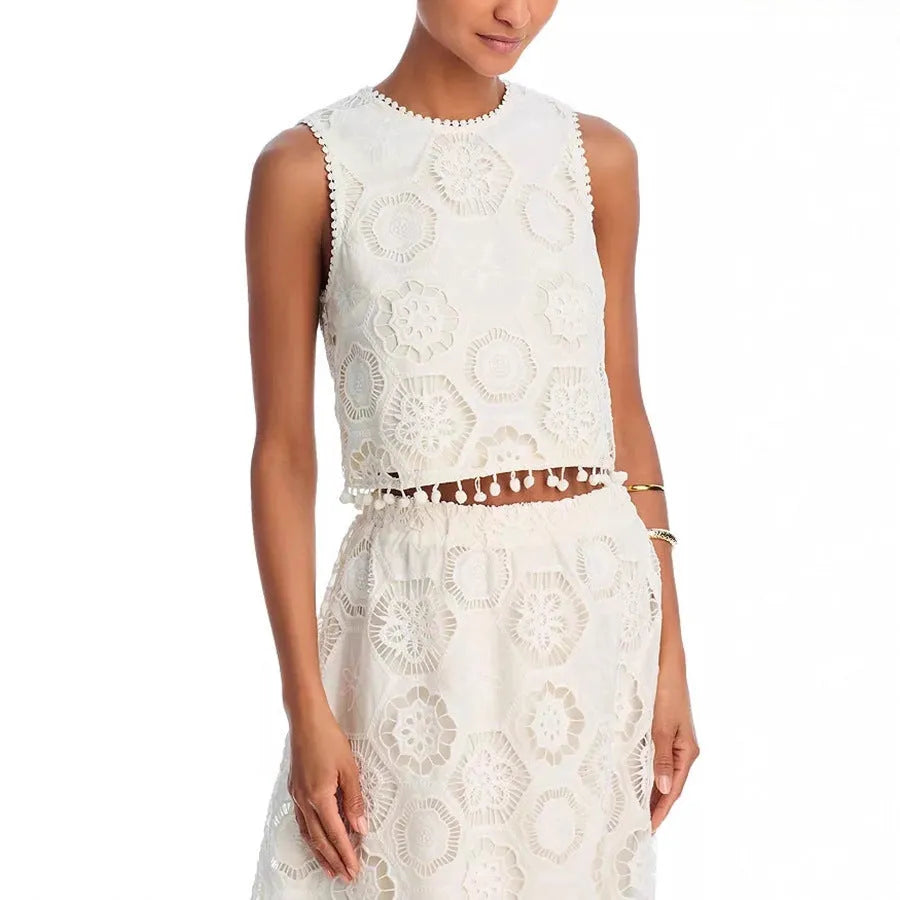 White women's retro style suit with sleeveless top, long skirt and embroidery detailing