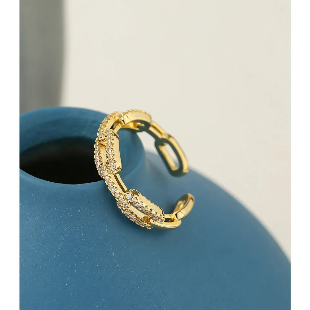 Gold ladies' ring with chain-style design encrusted with micro-inlaid CZ zircon stones, adjustable opening, copper base