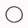 Geometric agate bracelet with obsidian, blue san and cut surface black agate beads