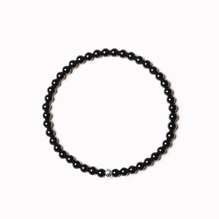 Geometric agate bracelet with obsidian, blue san and cut surface black agate beads