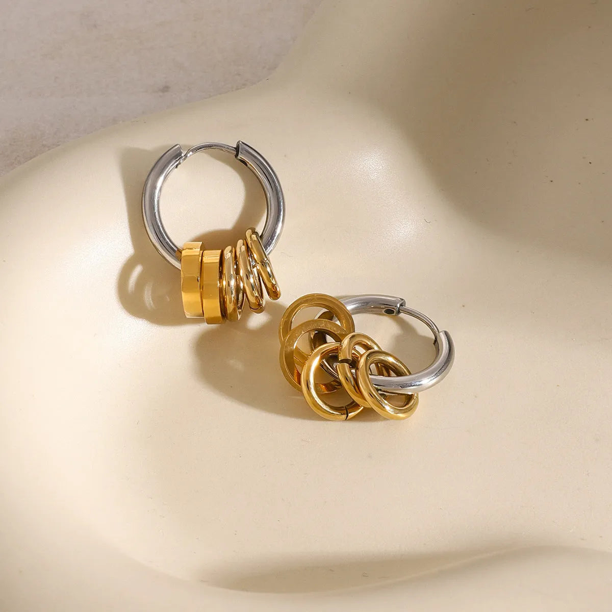 A pair of ins style stainless steel earrings with an electroplated colour finish.