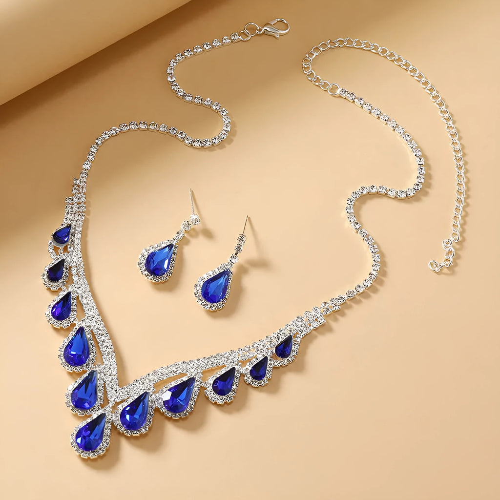 Royal Blue White K alloy jewellery set with a regular chain necklace and earrings on display