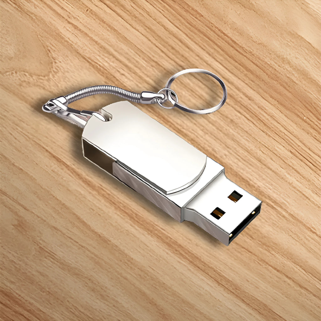 Small white metal USB flash drive with a swivelling silver cap showing connector.