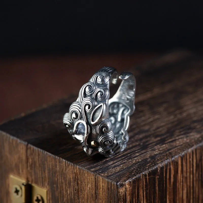 Silver open style ring with Jibeast animal zodiac pattern and diamond detailing