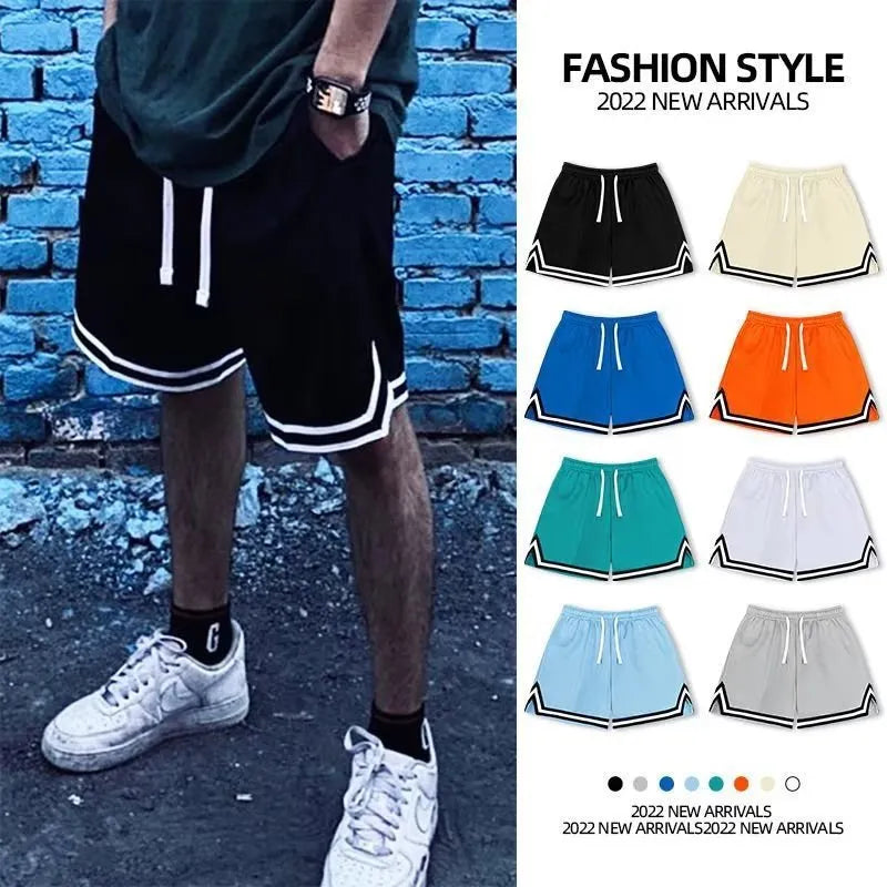 Men's elastic polyester summer shorts in a loose fit, shown in a choice of colours like black or apricot.