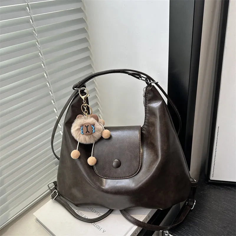 Women's black PU leather horizontal square shoulder bag with single strap and mobile phone compartment