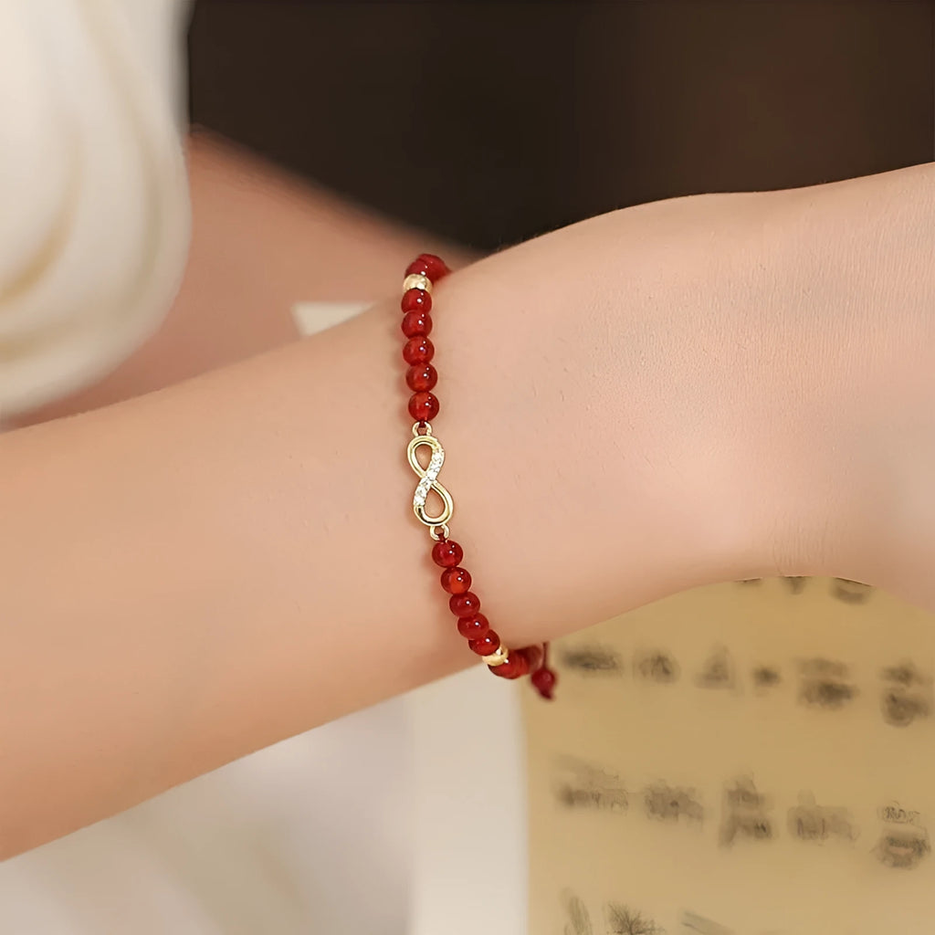 Hand-woven red agate bracelet with diamond beads in ethnic woven pattern
