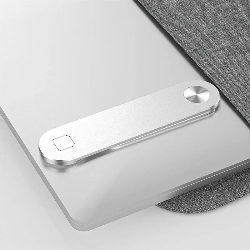 Black aluminium laptop phone holder with magnetic mount attached to computer monitor