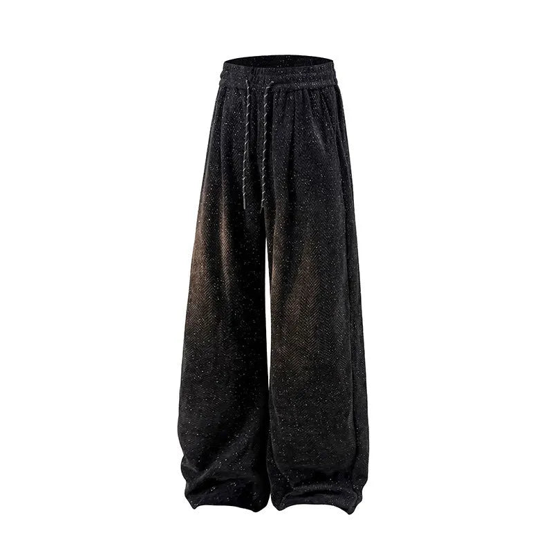 Light gray fleece-lined straight-leg trousers with a hollow-out design on a hanger.