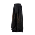 Light gray fleece-lined straight-leg trousers with a hollow-out design on a hanger.