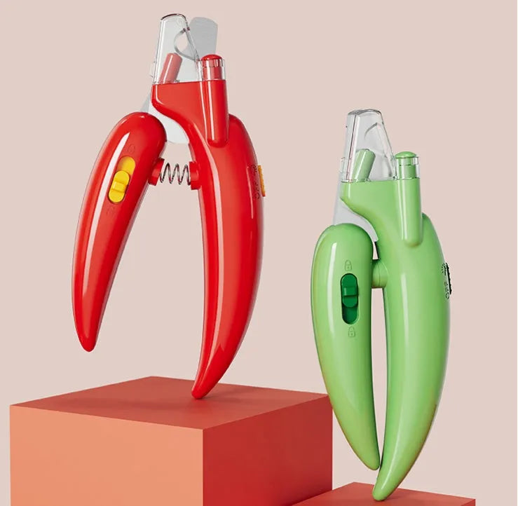 New LED blood line pet nail clippers with metal body in green, red, and yellow for cats and dogs