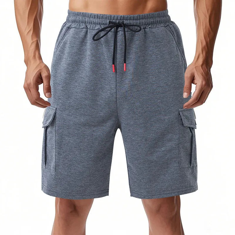 Man's heavy terry fabric cargo shorts in light grey, showing loose fit and multiple pockets.
