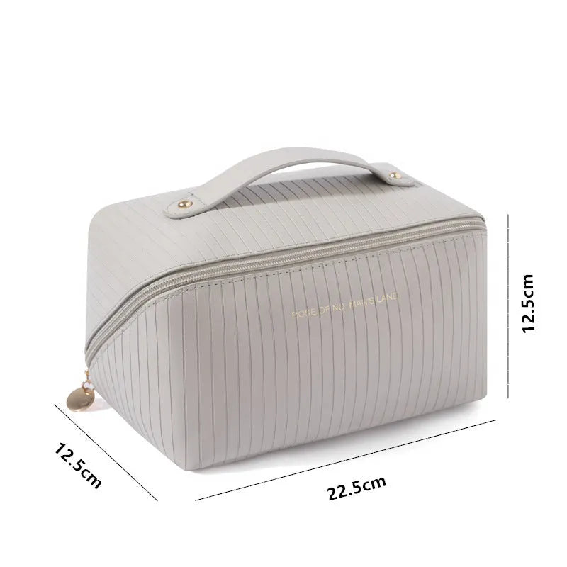 Vertical pattern cubic makeup bag in PU material with 22.5cm height for travel storage