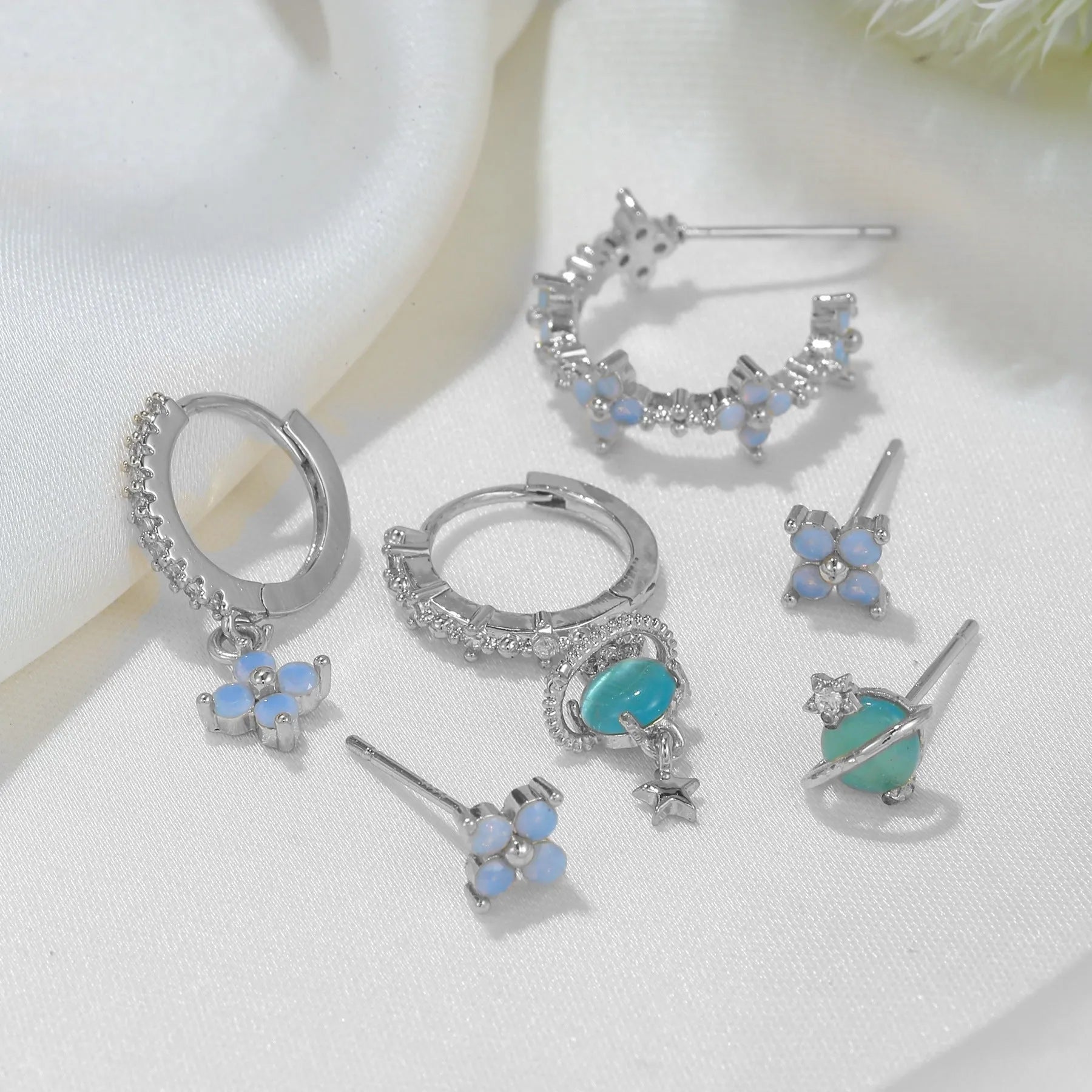 Blue zircon flower stud earrings in Japanese Korean style with gold or silver metal finish
