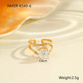 Gold-toned stainless steel ring with zircon details in a geometric heart shape design on a finger.