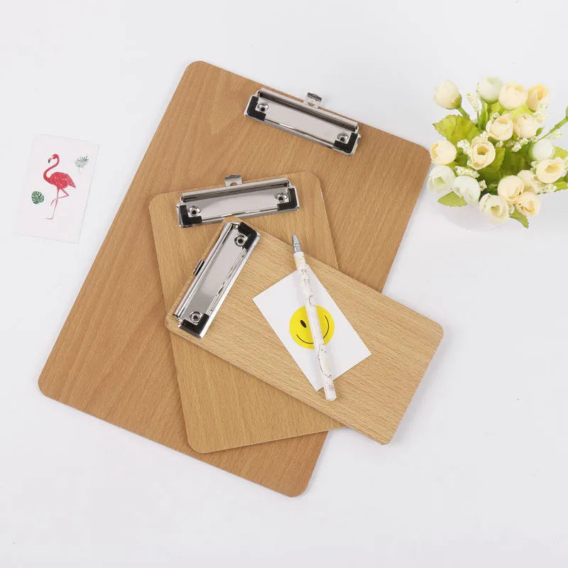 A4 hard wooden clipboard with metal clip and hanging hole, 22.5 by 31.5 cm, natural wood colour