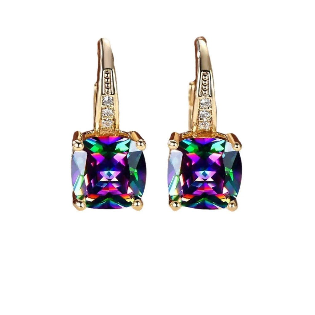 Square geometric moissanite ear clip in gold electroplated finish on copper.