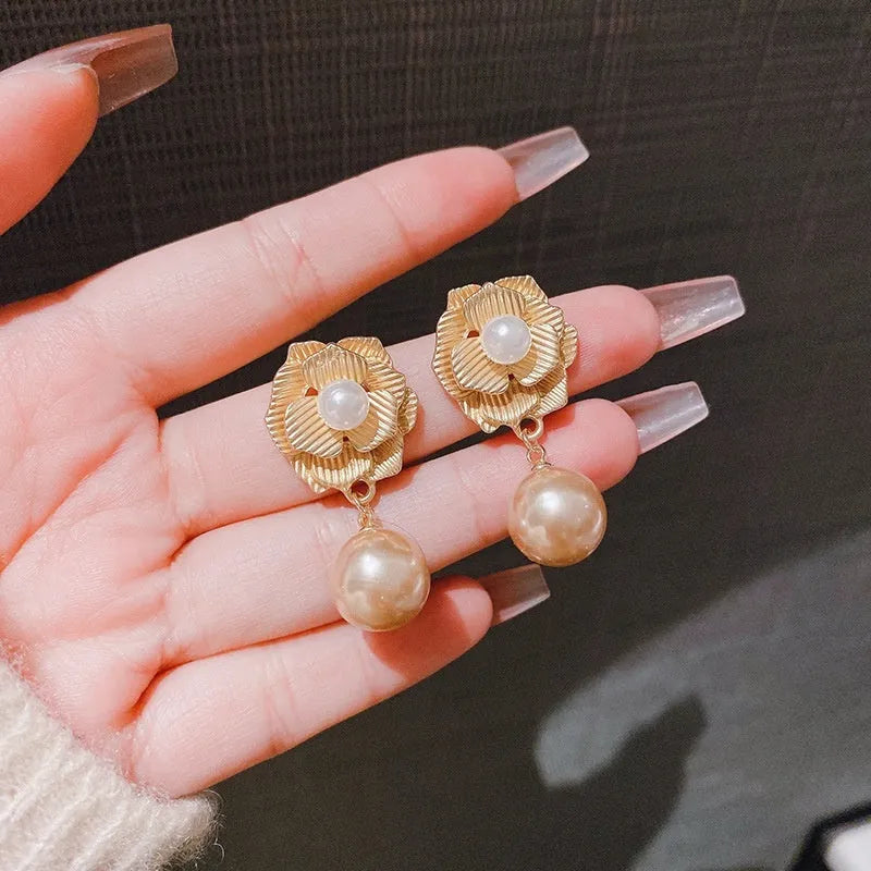 Gold colour flower stud earrings with needle rose pearl design and opal stone
