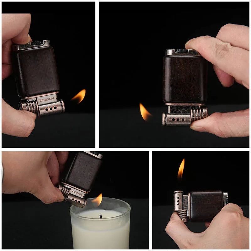 Black wood gas lighter with rosewood decorative finishes including sun face design