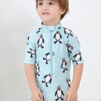 Boys' penguin print one-piece swimsuit with long sleeves and matching swimming cap for children aged 2-7 years