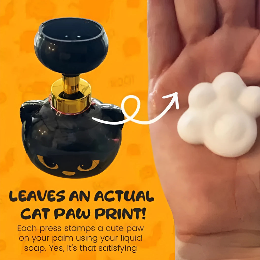Black plastic cat-shaped cartoon foam soap dispenser pump bottle on a countertop.