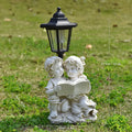 Hexagonal solar garden lamp in synthetic resin with decorative design