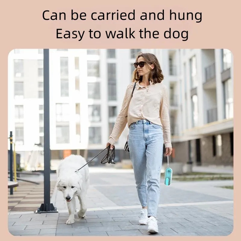 Blue portable dog water bottle with a folded pink silicone drinking bowl attached to its side.