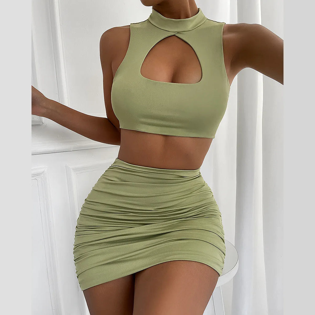 Women's light purple elastic polyester two-piece set with hollow-out vest top and split hip skirt