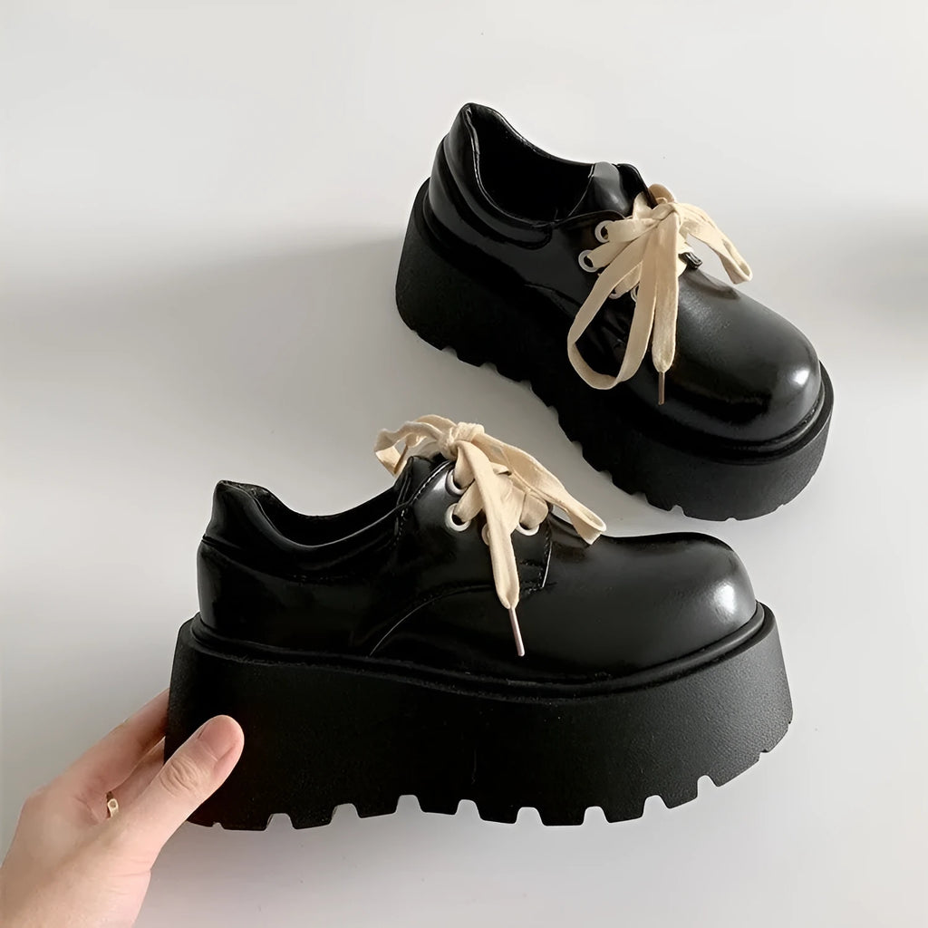 Matte black women's lace-up shoes with a thick rubber sole and a 6-8cm English muffin heel