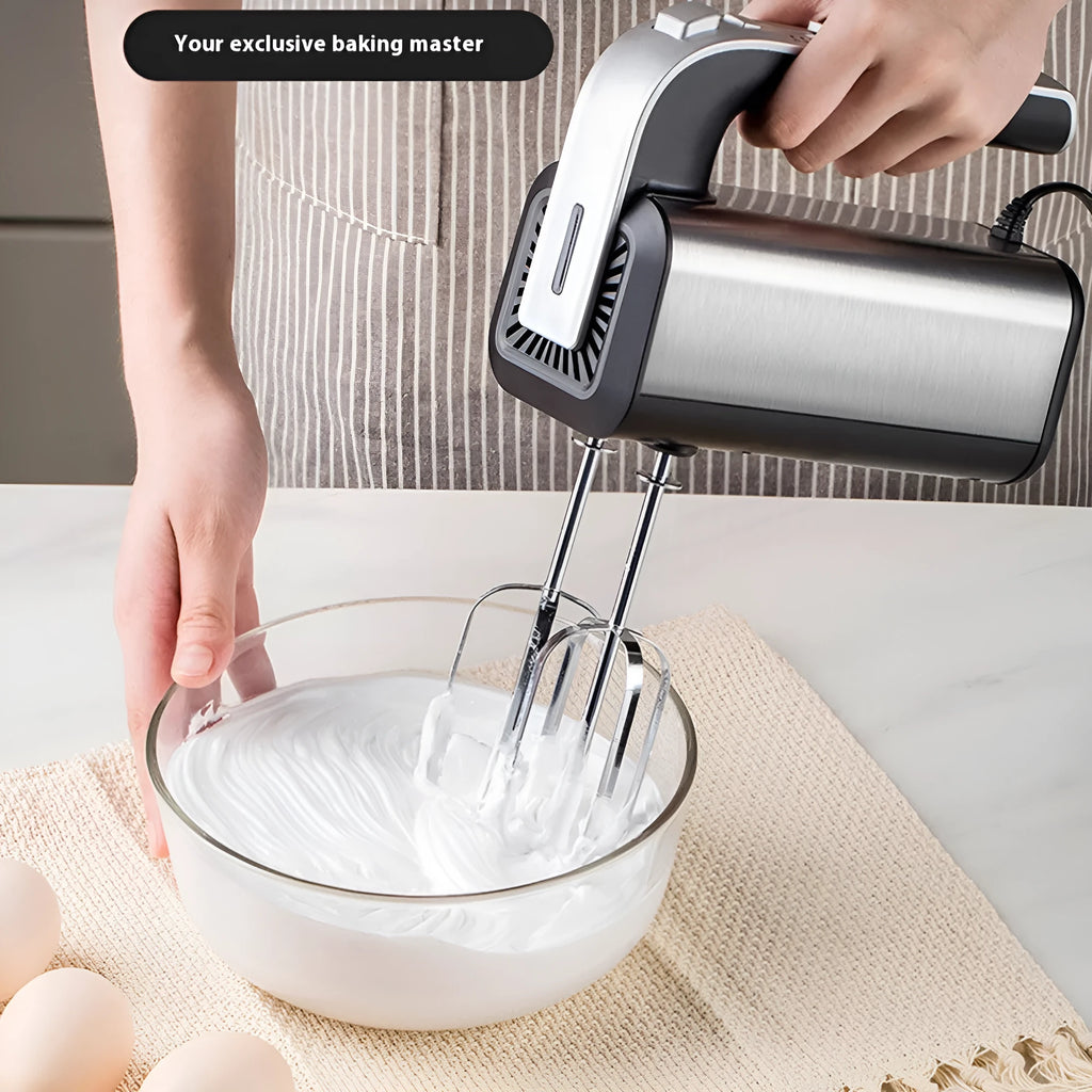 Silver handheld electric whisk with stainless steel beaters and five-speed control dial.