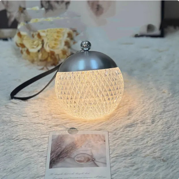 Portable dimmable touch LED night lamp in chrome finish with 12cm diameter