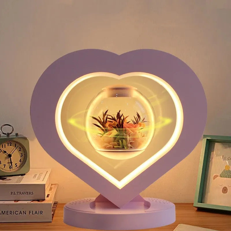 Pink preserved real rose ornament in a decorative case with optional base and Bluetooth speaker.
