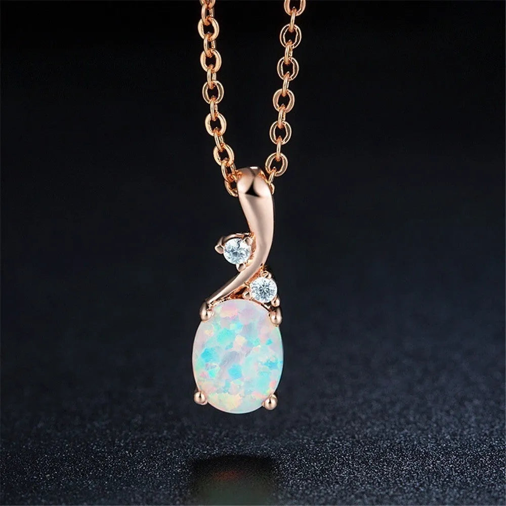 Water drop opal pendant on an adjustable alloy chain necklace in rose gold colour