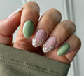 Long almond artificial nails with white little flower pattern and jelly glue rub in CW680 colour classification